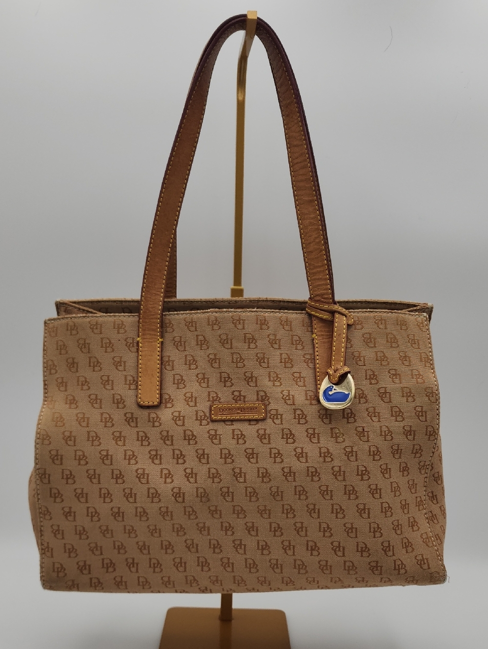 Dooney & Bourke Signature Monnogram Brown And Pink Satchel Bag‎